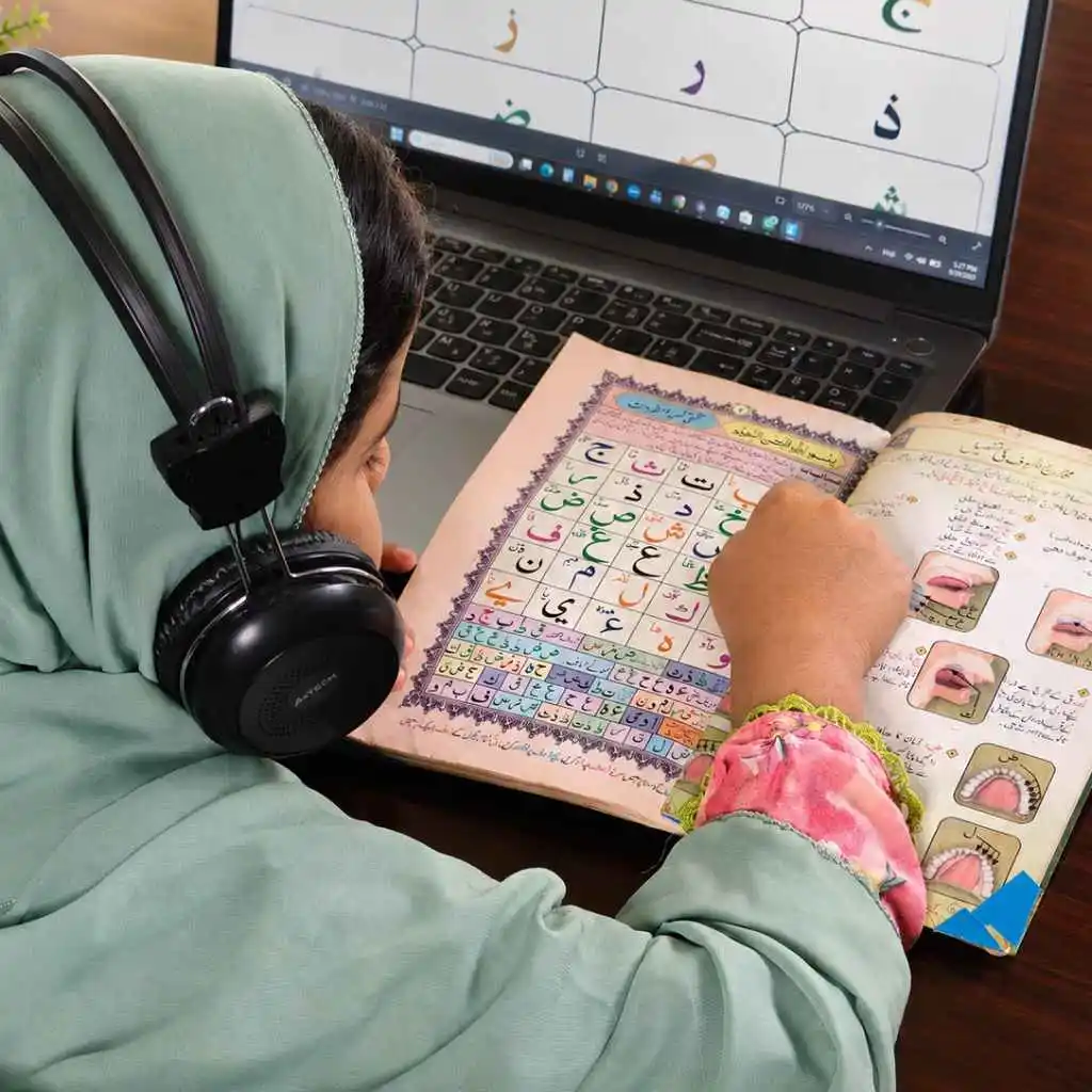 This girl is learning Quran at home in UK